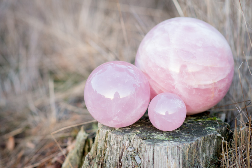 3 rose quartz crystal balls in different sizes